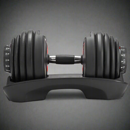52.5 lb adjustable dumbbell with metal handle and rubber-coated plates
Side view of single adjustable dumbbell for compact home gym use
Unboxed adjustable dumbbell set with weight plate configuration
Compact strength training dumbbell with ergonomic grip
