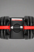 52.5 lb adjustable dumbbell with metal handle and rubber-coated plates
Side view of single adjustable dumbbell for compact home gym use
Unboxed adjustable dumbbell set with weight plate configuration
Compact strength training dumbbell with ergonomic grip
