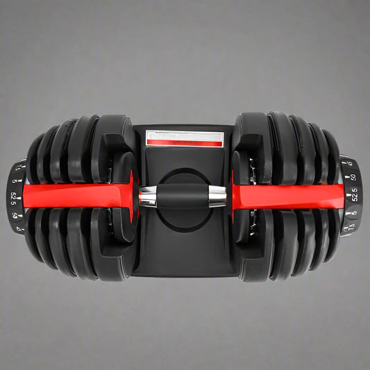 52.5 lb adjustable dumbbell with metal handle and rubber-coated plates
Side view of single adjustable dumbbell for compact home gym use
Unboxed adjustable dumbbell set with weight plate configuration
Compact strength training dumbbell with ergonomic grip