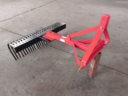 Red 5 FT landscape rake for tractor with 3-point hitch

Side view of landscape rake attachment on concrete

Close-up of tine design and mounting frame

3-point hitch mount landscape rake back view