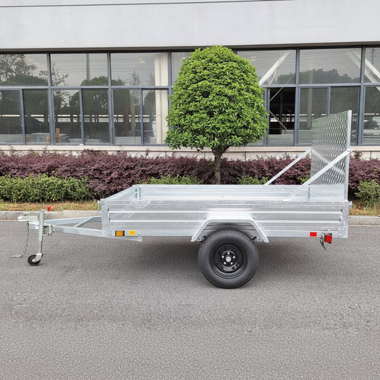 "5x8 galvanized utility trailer with built-in ATV ramps"

"Rust-resistant utility trailer parked near grass lot"

"Heavy-duty galvanized trailer with side view of ramps"