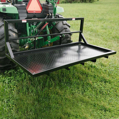 6 FT carry all platform for tractors – 3-point hitch rear attachment
Rear view of black steel tractor carry platform with diamond plate deck
Close-up of pallet fork-compatible blade pockets on tractor platform