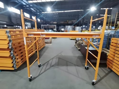 6 FT steel scaffolding unit front view

Adjustable yellow steel scaffold with caster wheels

Platform scaffold in warehouse environment
