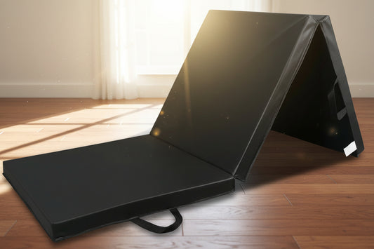 Foldable 6x2 Ft Black Yoga Gym Mat

Tri-Fold Compact Exercise Mat Side View

Closed Tri-Fold Fitness Mat for Storage

Yoga Mat Folded in Black EPE Foam

Portable Mat with Carry Handles