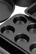 Overhead of full 6-piece non-stick baking set

Close-up of muffin tin with non-stick carbon steel texture

Side-by-side comparison of pan thickness and quality

Set displayed stacked for compact storage

Bakeware in oven with baked items (if applicable)