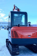 6 Ton Red Mini Excavator at Work in Snow – Side View

Compact Tracked Excavator – Hydraulic Boom in Operation

Mini Excavator Digging in Construction Zone – Model 1027621

Tracked Compact Excavator on Job Site – Red Machine Front View