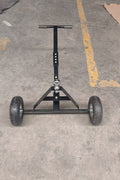 Manual hitch dolly TD600 with trailer hookup on pavement

Close-up of TD600 trailer dolly wheels and hitch ball

Side view of trailer dolly being manually pushed

Hand-push trailer dolly on gravel driveway
