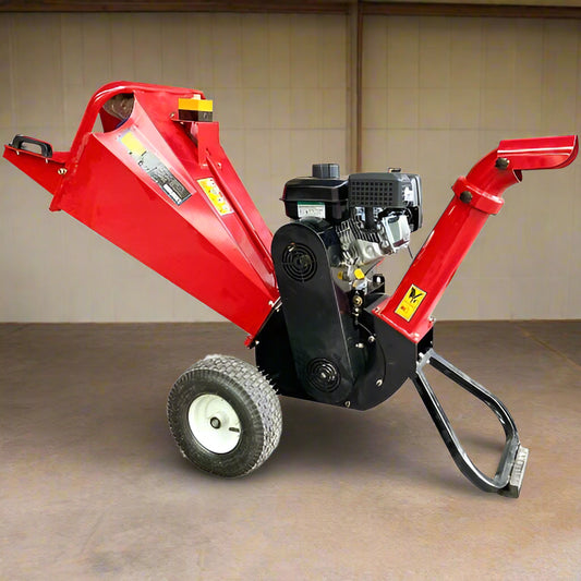 6.5 HP Wood Chipper with Briggs & Stratton engine – side view
Red GS100 wood chipper – front chute and wheels
Compact gasoline-powered wood chipper in garage setup
Rear view of GS100 chipper with large discharge chute