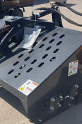 "68 inch skid steer landscape rake bucket with hydraulic top cover"
"Heavy-duty grading tool for skid steer loaders"
"Landscape rake with travel skids and handheld remote"
"Hydraulic rake attachment in action on construction site"