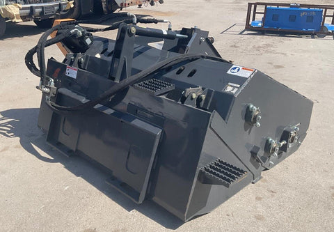"68 inch skid steer landscape rake bucket with hydraulic top cover"
"Heavy-duty grading tool for skid steer loaders"
"Landscape rake with travel skids and handheld remote"
"Hydraulic rake attachment in action on construction site"