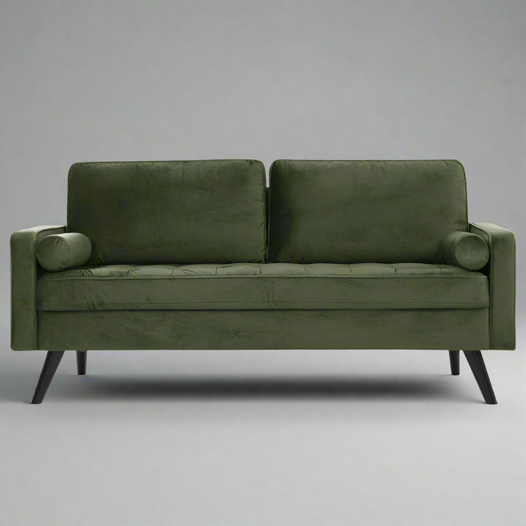 69.7-inch modern velvet sofa in navy blue with tufted back

Gray velvet upholstered sofa with pillows

Side view of modern green couch with wooden legs

Mid-century couch with tufted back and square arms