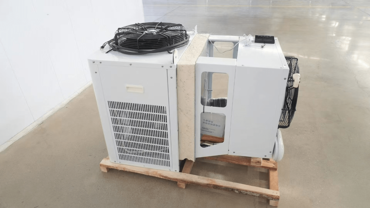 “Commercial walk-in freezer installed in warehouse”

“Modular cold room with open door and interior view”

“Flat-packed walk-in cooler components and hardware”

“Exterior view of insulated freezer unit panel walls”

“Walk-in chiller unit with digital controller and lockable door”