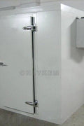 “Commercial walk-in freezer installed in warehouse”

“Modular cold room with open door and interior view”

“Flat-packed walk-in cooler components and hardware”

“Exterior view of insulated freezer unit panel walls”

“Walk-in chiller unit with digital controller and lockable door”