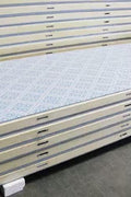 “Commercial walk-in freezer installed in warehouse”

“Modular cold room with open door and interior view”

“Flat-packed walk-in cooler components and hardware”

“Exterior view of insulated freezer unit panel walls”

“Walk-in chiller unit with digital controller and lockable door”