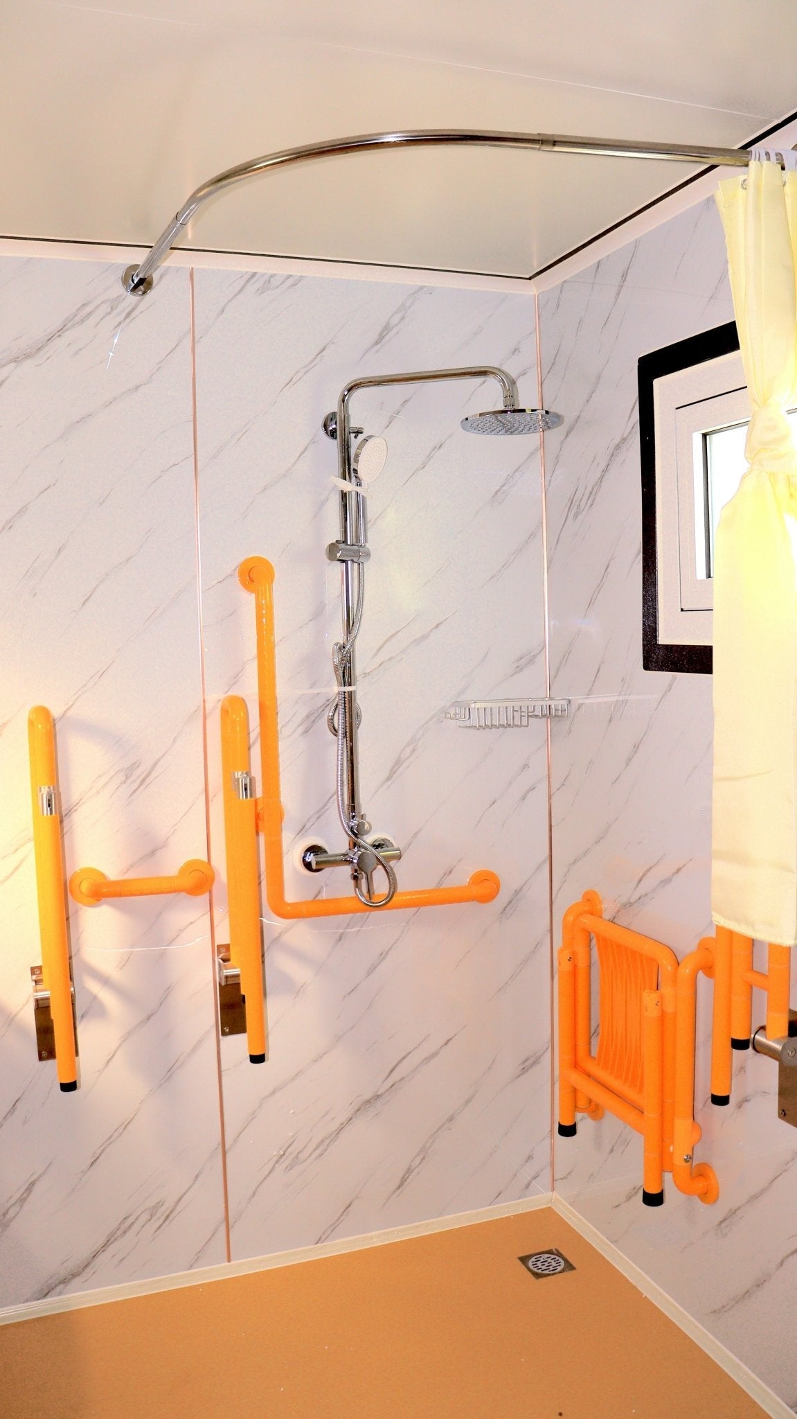 7-foot ADA-compliant portable restroom with ramp in outdoor setting
Inside view of wheelchair-accessible bathroom interior
Front door of handicap bathroom unit with ramp
Washbasin and toilet setup in ADA portable unit
Side view of accessible bathroom setup