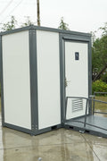 7-foot ADA-compliant portable restroom with ramp in outdoor setting
Inside view of wheelchair-accessible bathroom interior
Front door of handicap bathroom unit with ramp
Washbasin and toilet setup in ADA portable unit
Side view of accessible bathroom setup