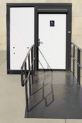 7-foot ADA-compliant portable restroom with ramp in outdoor setting
Inside view of wheelchair-accessible bathroom interior
Front door of handicap bathroom unit with ramp
Washbasin and toilet setup in ADA portable unit
Side view of accessible bathroom setup