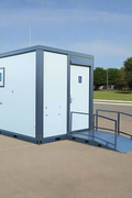 7-foot ADA-compliant portable restroom with ramp in outdoor setting
Inside view of wheelchair-accessible bathroom interior
Front door of handicap bathroom unit with ramp
Washbasin and toilet setup in ADA portable unit
Side view of accessible bathroom setup