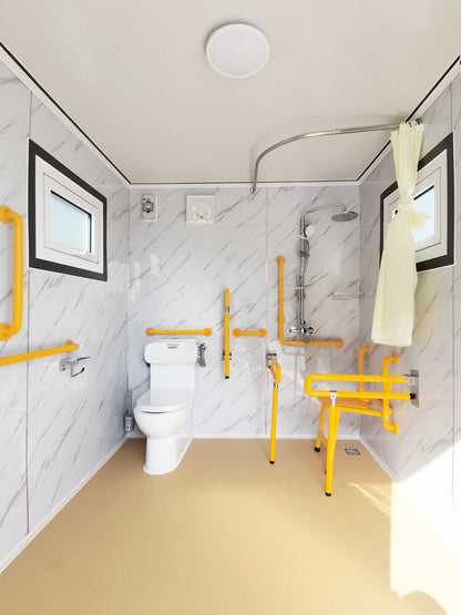 7-foot ADA-compliant portable restroom with ramp in outdoor setting
Inside view of wheelchair-accessible bathroom interior
Front door of handicap bathroom unit with ramp
Washbasin and toilet setup in ADA portable unit
Side view of accessible bathroom setup