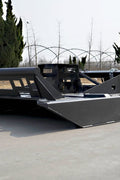 72 inch skid steer brush mower angled view

Underside of heavy-duty cutting blades

66 inch mower installed on skid steer

Skid steer clearing brush and saplings

Blade set and replacement part display