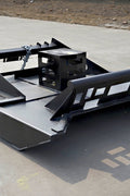 72 inch skid steer brush mower angled view

Underside of heavy-duty cutting blades

66 inch mower installed on skid steer

Skid steer clearing brush and saplings

Blade set and replacement part display