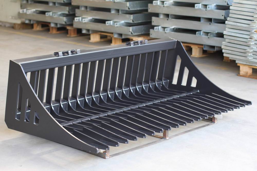 Heavy-duty skid steer skeleton rock bucket – front angled view

Close-up of reinforced steel tines and grapple mounts

84” rock bucket on skid steer in yard cleanup

Side view of skeleton-style skid loader bucket

Multiple bucket sizes displayed on gravel lot