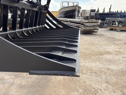 72" hydraulic grapple bucket on skid steer

Skid steer rock grapple front view

Close-up of grapple teeth and hoses

Dual-cylinder grapple open position

Grapple attachment lifting heavy debris