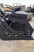 72" hydraulic grapple bucket on skid steer

Skid steer rock grapple front view

Close-up of grapple teeth and hoses

Dual-cylinder grapple open position

Grapple attachment lifting heavy debris