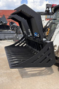 72" hydraulic grapple bucket on skid steer

Skid steer rock grapple front view

Close-up of grapple teeth and hoses

Dual-cylinder grapple open position

Grapple attachment lifting heavy debris