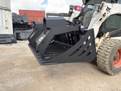 72" hydraulic grapple bucket on skid steer

Skid steer rock grapple front view

Close-up of grapple teeth and hoses

Dual-cylinder grapple open position

Grapple attachment lifting heavy debris