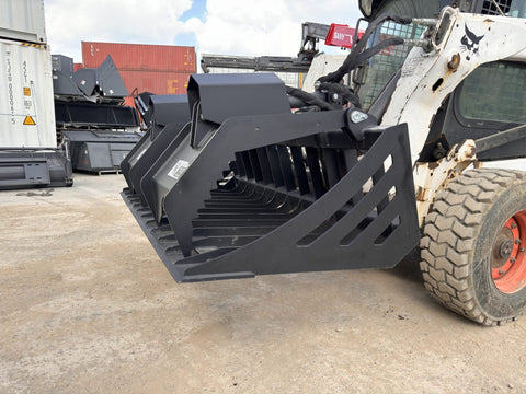 72" hydraulic grapple bucket on skid steer

Skid steer rock grapple front view

Close-up of grapple teeth and hoses

Dual-cylinder grapple open position

Grapple attachment lifting heavy debris