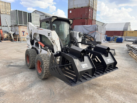 72" hydraulic grapple bucket on skid steer

Skid steer rock grapple front view

Close-up of grapple teeth and hoses

Dual-cylinder grapple open position

Grapple attachment lifting heavy debris
