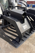 72" hydraulic grapple bucket on skid steer

Skid steer rock grapple front view

Close-up of grapple teeth and hoses

Dual-cylinder grapple open position

Grapple attachment lifting heavy debris