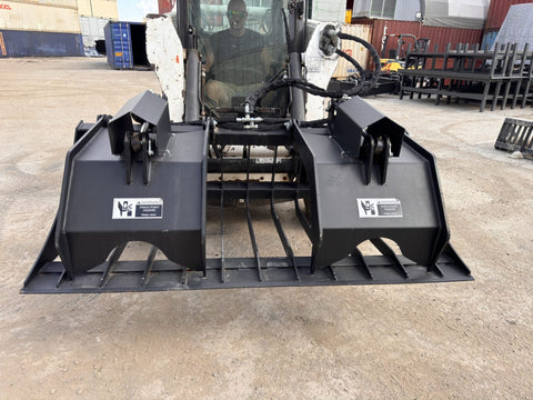 72" hydraulic grapple bucket on skid steer

Skid steer rock grapple front view

Close-up of grapple teeth and hoses

Dual-cylinder grapple open position

Grapple attachment lifting heavy debris