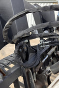 72" hydraulic grapple bucket on skid steer

Skid steer rock grapple front view

Close-up of grapple teeth and hoses

Dual-cylinder grapple open position

Grapple attachment lifting heavy debris