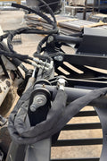 72" hydraulic grapple bucket on skid steer

Skid steer rock grapple front view

Close-up of grapple teeth and hoses

Dual-cylinder grapple open position

Grapple attachment lifting heavy debris