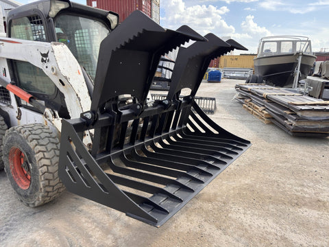 72" hydraulic grapple bucket on skid steer

Skid steer rock grapple front view

Close-up of grapple teeth and hoses

Dual-cylinder grapple open position

Grapple attachment lifting heavy debris