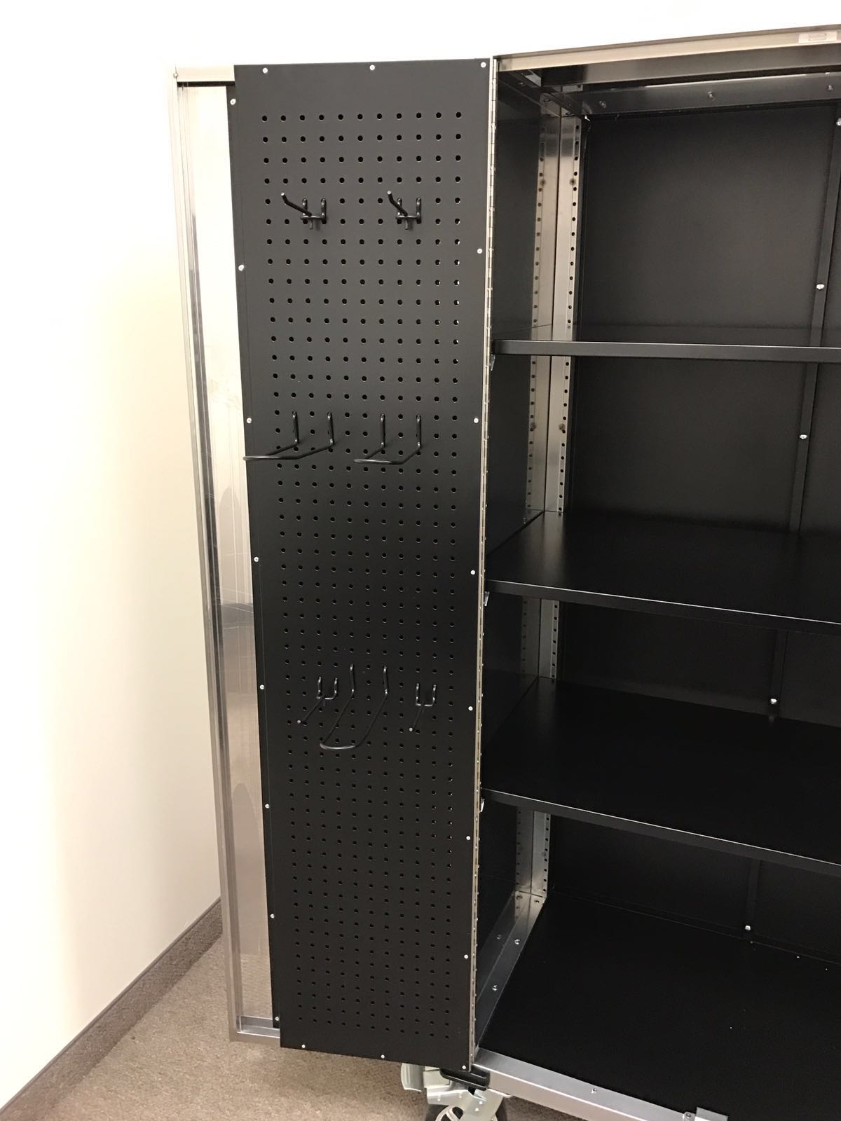 72 inch stainless steel rolling tool cabinet with dual locks

Industrial lockable storage cabinet on wheels

Powder-coated steel garage cabinet with smooth casters

Open view of tool cabinet with adjustable shelves

Heavy-duty mobile workshop cabinet with dual security locks