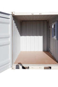 Gray 7FT steel office container with side door and windows
Interior view of 12FT jobsite office sea container
Office container unit with swing door and locking system
Plywood flooring inside portable office container
Security window with locking bar on steel sea container