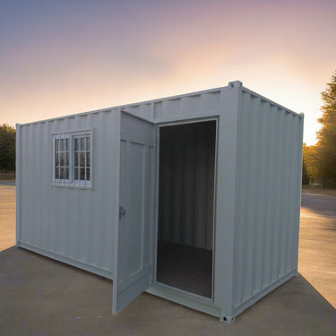 Gray 7FT steel office container with side door and windows
Interior view of 12FT jobsite office sea container
Office container unit with swing door and locking system
Plywood flooring inside portable office container
Security window with locking bar on steel sea container