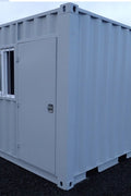 Gray 7FT steel office container with side door and windows
Interior view of 12FT jobsite office sea container
Office container unit with swing door and locking system
Plywood flooring inside portable office container
Security window with locking bar on steel sea container