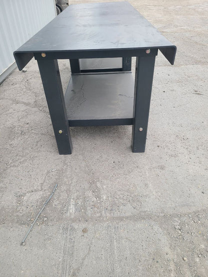 Heavy-duty steel welding table – 8 FT version
Side angle view of the 10 FT steel workbench
Industrial fabrication bench close-up
Front view showing welded leg design
Multiple steel tables in workshop setting