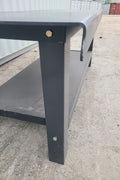 Heavy-duty steel welding table – 8 FT version
Side angle view of the 10 FT steel workbench
Industrial fabrication bench close-up
Front view showing welded leg design
Multiple steel tables in workshop setting