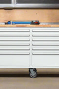 8FT Fatboy industrial tool bench with drawers and USB ports
Heavy-duty 24-drawer tool bench with stainless steel finish
Workshop organization tool bench with hardwood top
Mobile workbench with caster wheels and lockable drawers