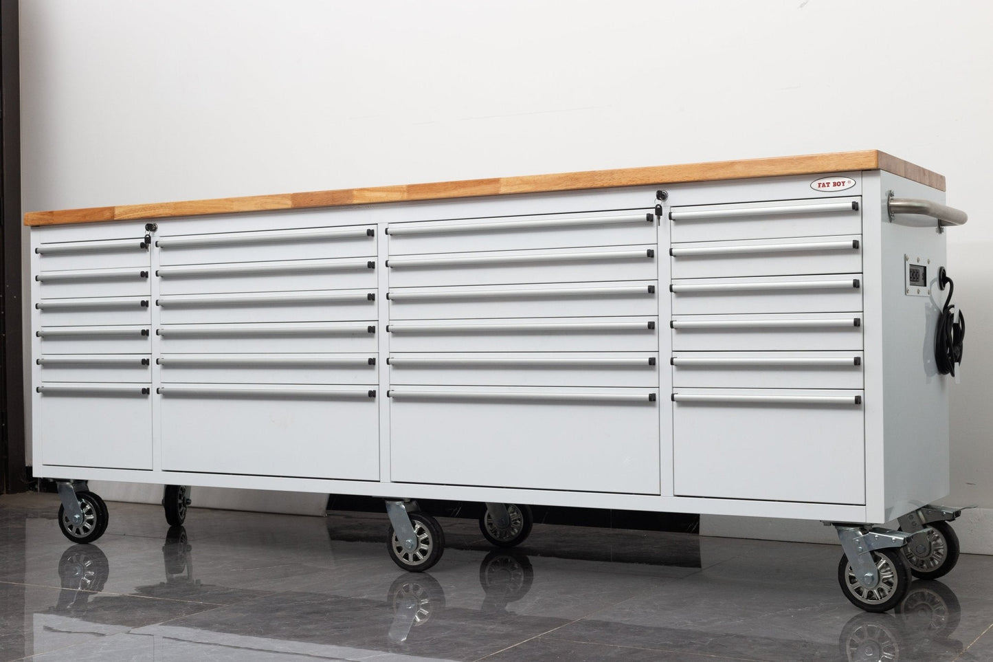 8FT Fatboy industrial tool bench with drawers and USB ports
Heavy-duty 24-drawer tool bench with stainless steel finish
Workshop organization tool bench with hardwood top
Mobile workbench with caster wheels and lockable drawers