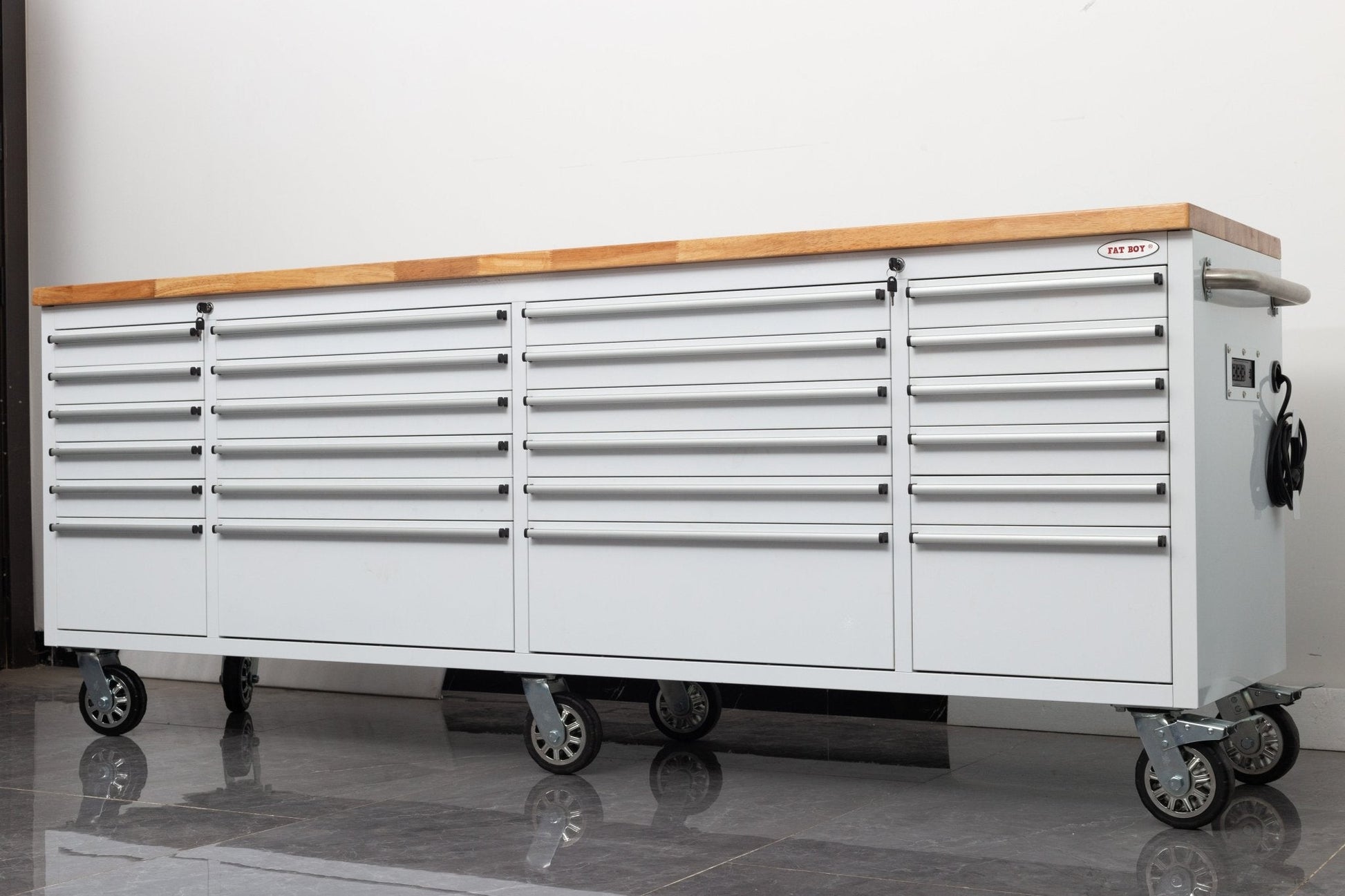 8FT Fatboy industrial tool bench with drawers and USB ports
Heavy-duty 24-drawer tool bench with stainless steel finish
Workshop organization tool bench with hardwood top
Mobile workbench with caster wheels and lockable drawers