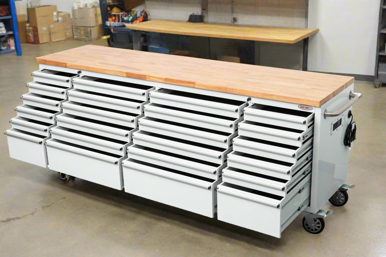 8FT Fatboy industrial tool bench with drawers and USB ports
Heavy-duty 24-drawer tool bench with stainless steel finish
Workshop organization tool bench with hardwood top
Mobile workbench with caster wheels and lockable drawers
