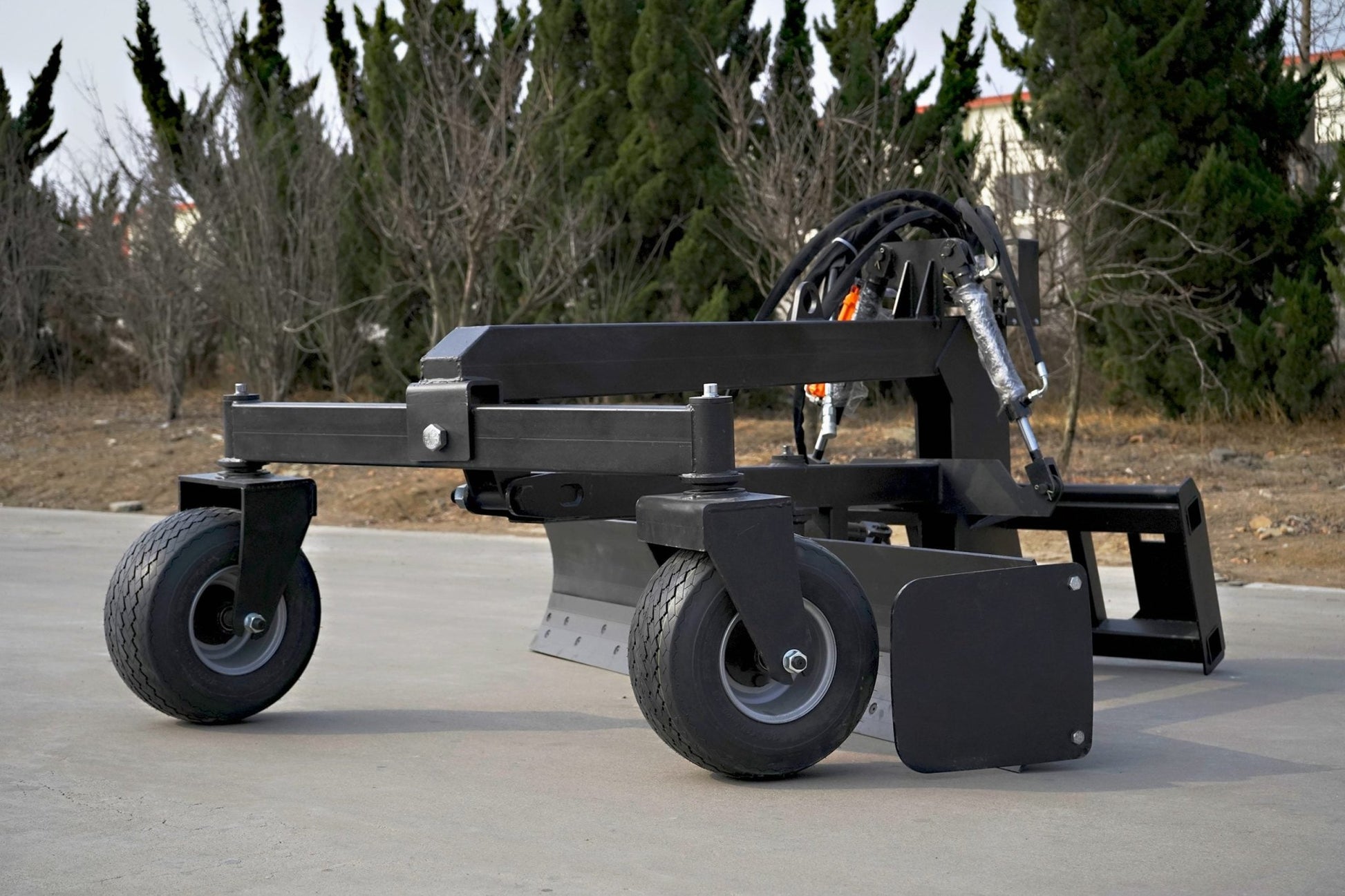 8FT Skid Steer Hydraulic Land Grader with Blade Tilt
Side View of Land Grader Attachment for Skid Steer
Blade Edge and Pneumatic Tires of Hydraulic Grader
In-Cab Controlled Land Grader Mounted on Skid Steer
Land Grading Attachment with Adjustable Angle and Tilt