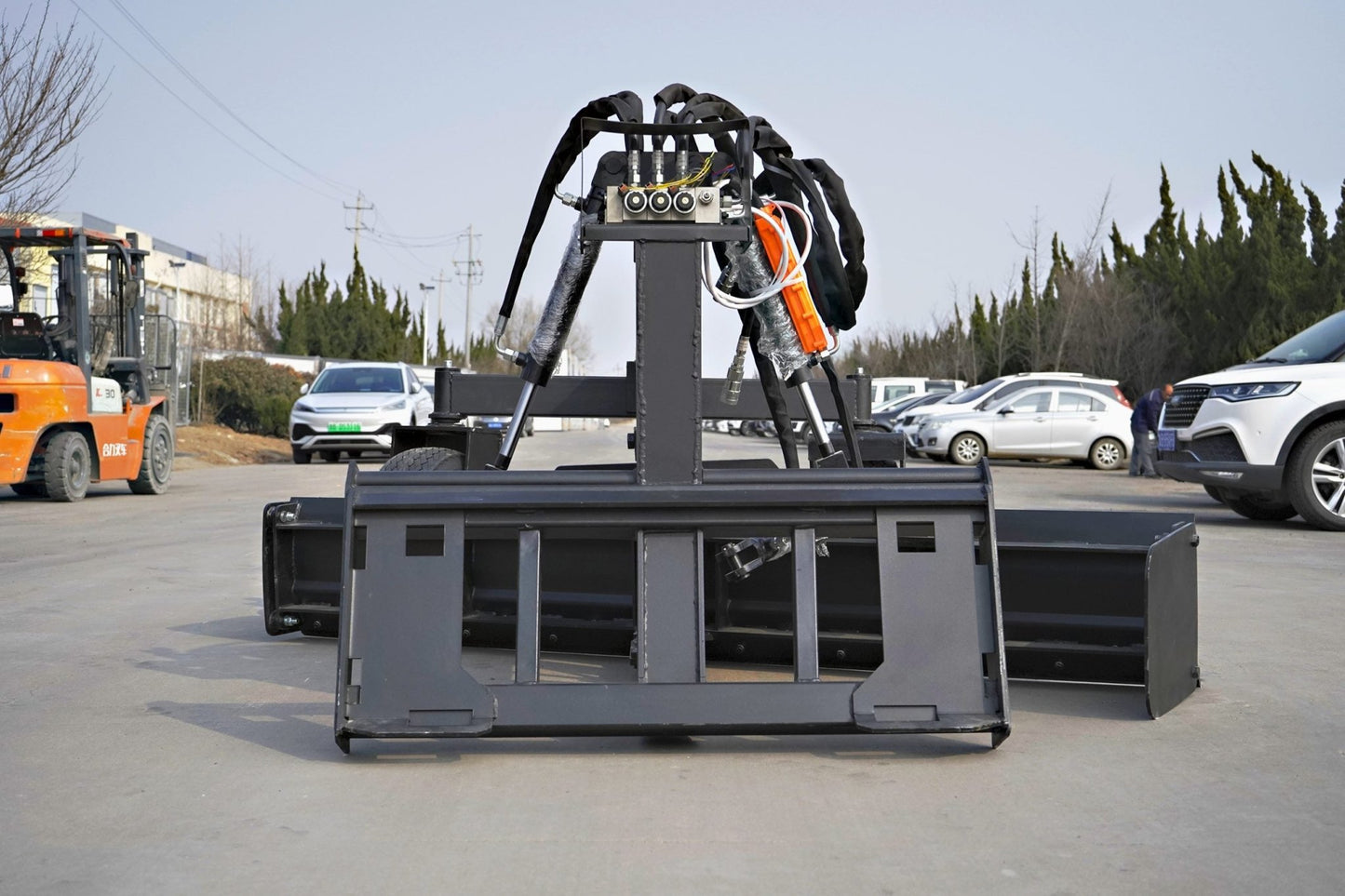 8FT Skid Steer Hydraulic Land Grader with Blade Tilt
Side View of Land Grader Attachment for Skid Steer
Blade Edge and Pneumatic Tires of Hydraulic Grader
In-Cab Controlled Land Grader Mounted on Skid Steer
Land Grading Attachment with Adjustable Angle and Tilt