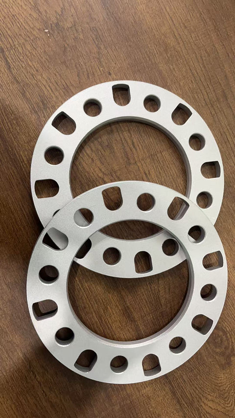 8-lug universal aluminum wheel spacers front view

High-quality lightweight 12mm truck wheel spacer set

Precision drilled bolt holes in 8-lug wheel spacer

Spacer inner diameter and bolt pattern detail

Side-by-side wheel spacer comparison for trucks